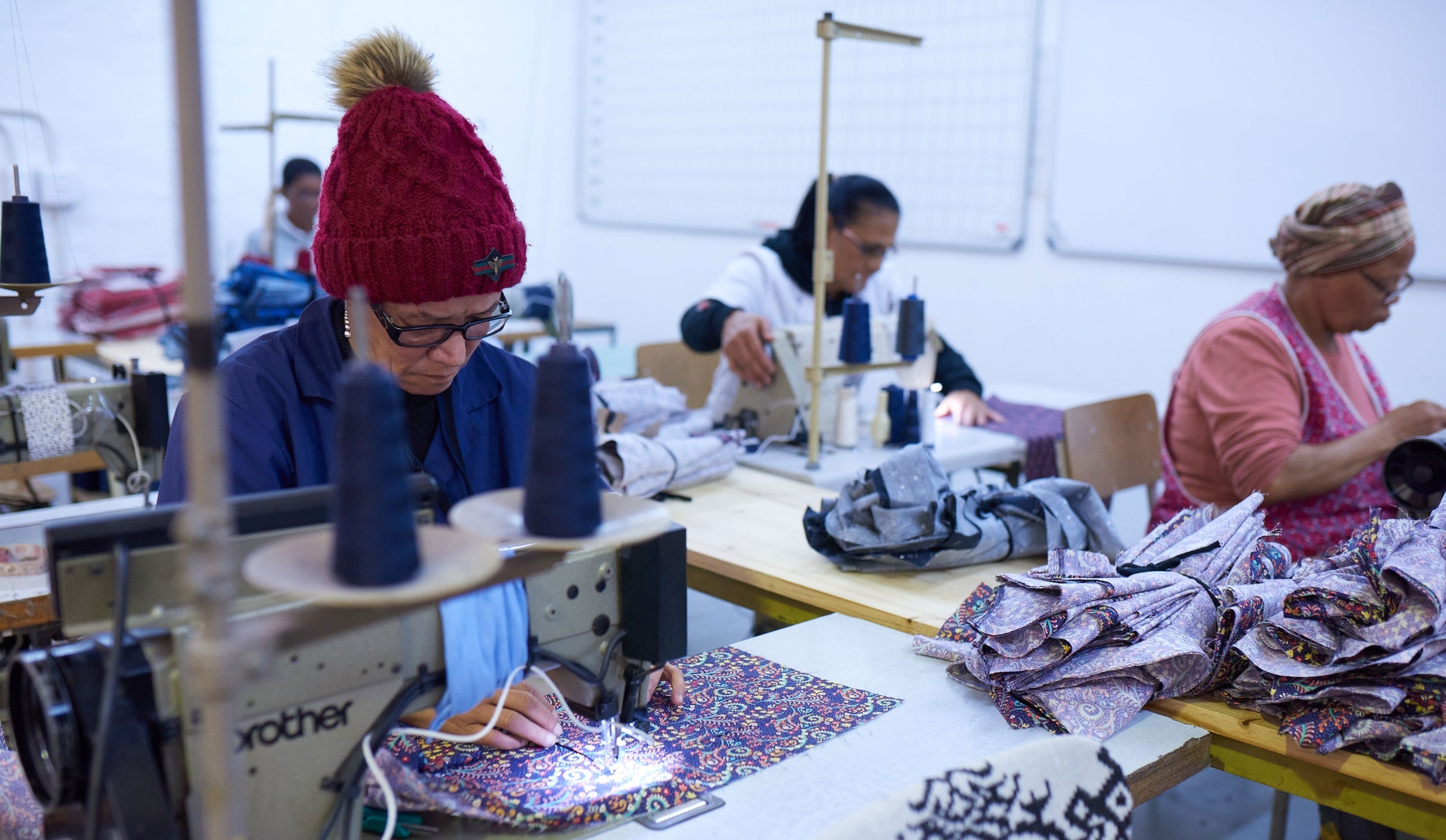 Seamstresses working in our factory - Woodstock Laundry UK